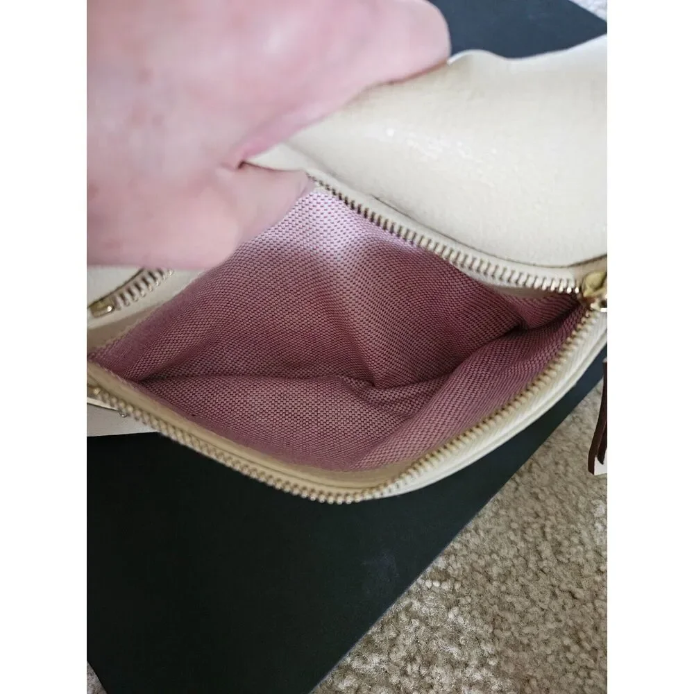 Dooney & Bourke tan leather hobo bag